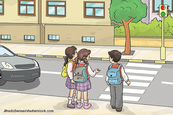 Illustration von Kindern, die über einen Zebrastreifen laufen