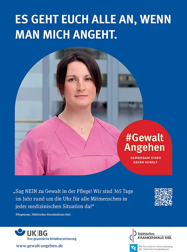 Zwei Klinikmitarbeitende zeigen klare Haltung gegen Gewalt im Krankenhaus.